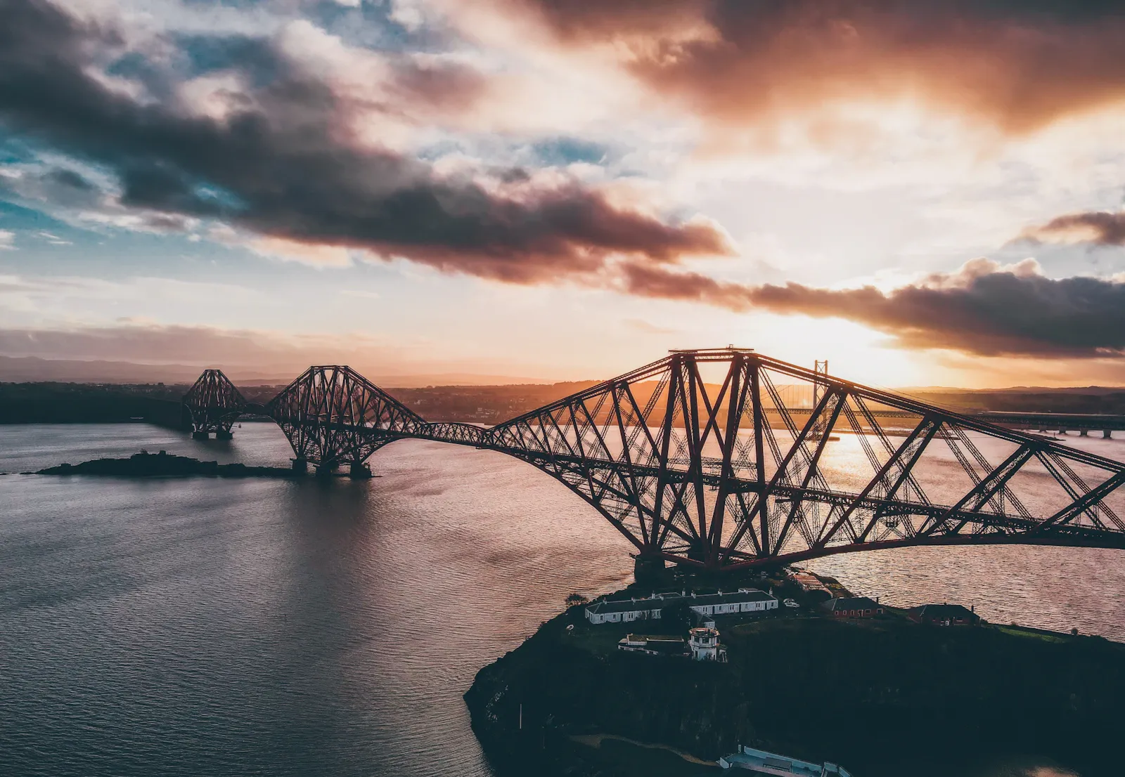 Aerial view of the Forth Bridge and its steel cantilever structure in Scotland